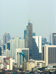 Fototapeta na wymiar The crane building on skyscraper