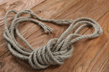 Ropes on a wooden background