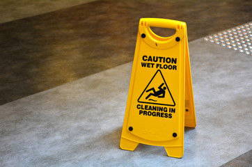Slippery floor surface warning sign  and symbol