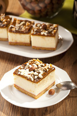 cheesecake with nuts on plate