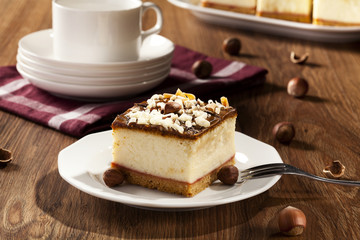 cheesecake with nuts on plate