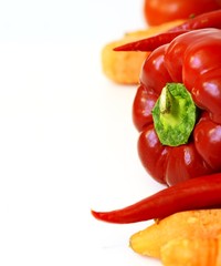 Pepper surrounded by other vegetables