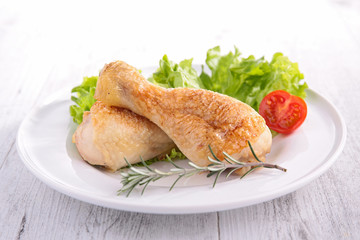 grilled chicken leg and salad