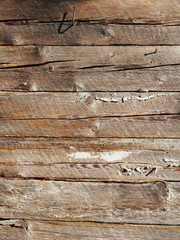 nail and its shadow on the wall