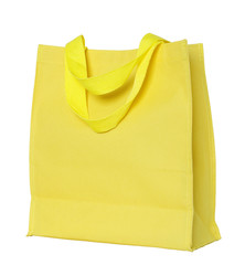 yellow canvas shopping bag isolated on white background with cli