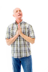 Senior man praying