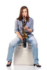 Naklejka premium woman with saxophone isolated on white