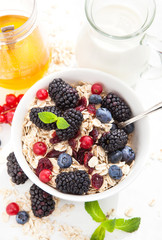 Healthy breakfast with granola and fresh berries