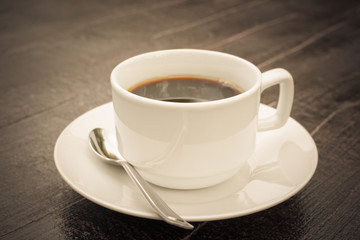 Obraz na płótnie Canvas coffee cup with retro filter effect