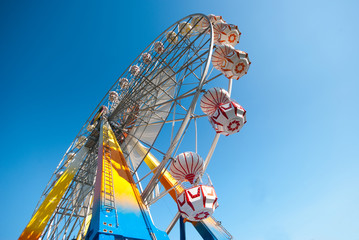 Ferris on vivid blue sky background