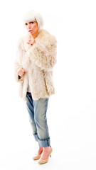 Obraz premium Senior woman with a finger on lips