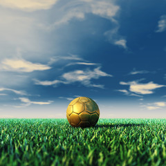 Fototapeta premium Soccer field and golden ball , daylight , Football