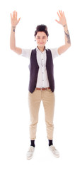 Young woman standing with arms raised