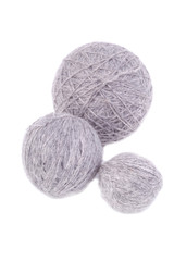 Grey wool yarn balls isolated on white