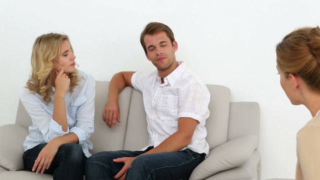 Couple talking with their therapist