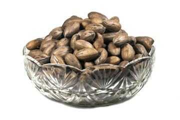 Decorative Glass Bowl Filled with Unshelled Pecan Nuts