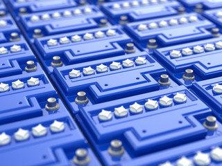Car batteries background. Blue accumulators.