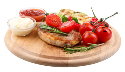 Grilled steak with spices, herbs and vegetables