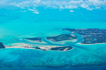 Fototapeta na wymiar Beautiful perfect view of exotic islands from aircraft