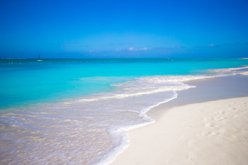 Perfect white beach with turquoise water at ideal island