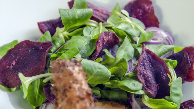 Chicken supreme baked breaded Pancho served withbeetroot chips