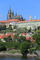 Obraz premium View on the spring Prague gothic Castle above River Vltava