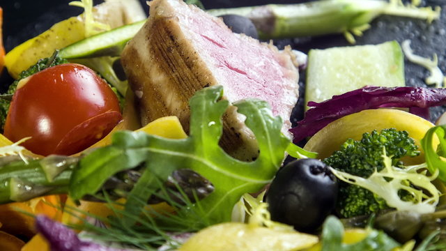 A variety of fresh and seasonal vegetables with grilled tuna
