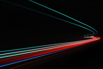 Car light trails in the tunnel.