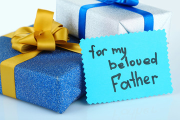 Happy Fathers Day tag with gift boxes, isolated on white