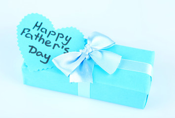 Happy Fathers Day tag with gift box, isolated on white