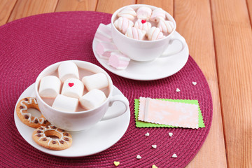 Cups of hot chocolate with marshmallows