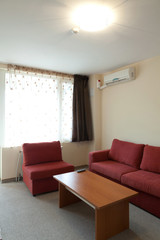 Interior Design: modern small hotel room with tv