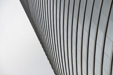 Curved glass facade of Hong Kong skyscraper