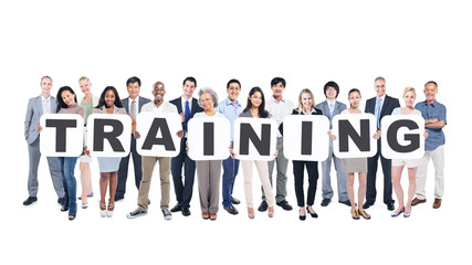 Group of Business People Holding Word Training
