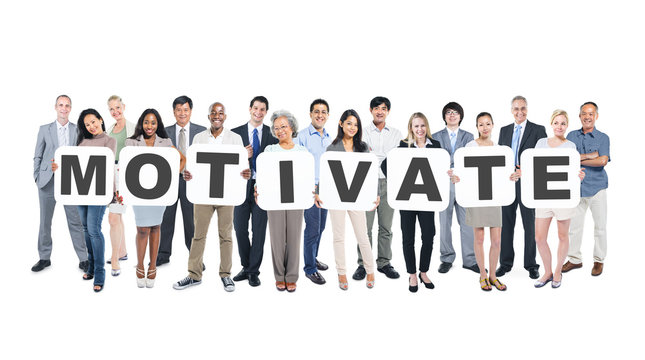 Group of Business People Holding Word Motivate