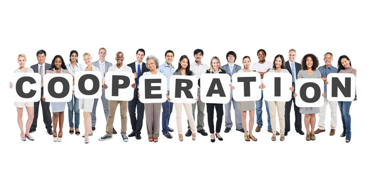 Group Of Diverse People Holding Word Cooperation