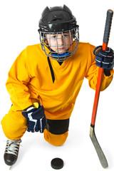 Youth hockey player standing on one knee