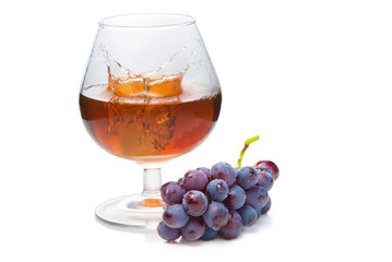 Glass of cogniac with a splash
