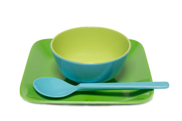 Melamine blue bowl and green dish on white background