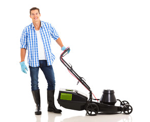 man standing next to an electric lawnmower