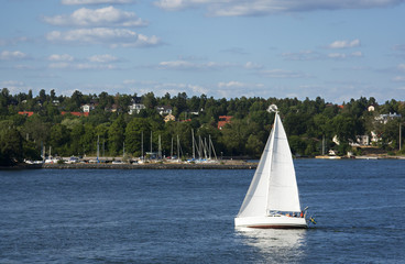 Obraz premium Лодка с парусом