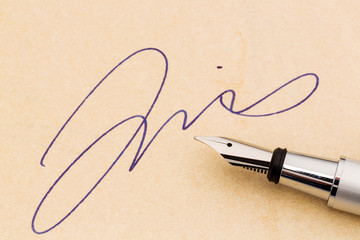 signature and fountain pen