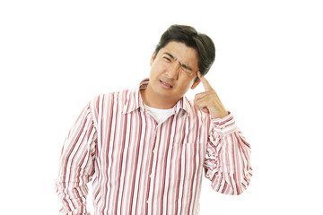 頭痛を訴える男性