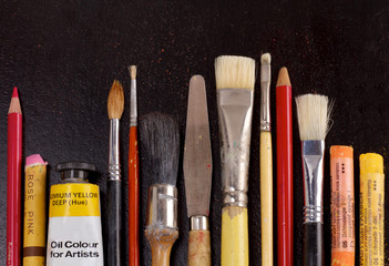 Diversity of art supplies in a row
