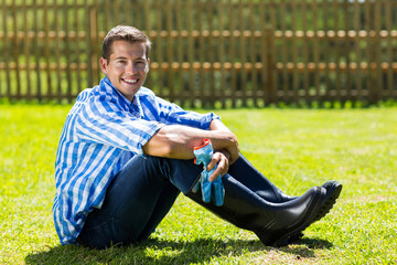 gardener sitting on lawn