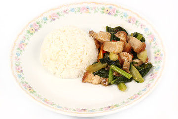Stir fried kale Crispy pork with steamed rice