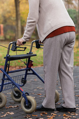 Obraz premium Disabled with walker on the outside