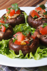 baked stuffed portobello mushrooms. macro vertical