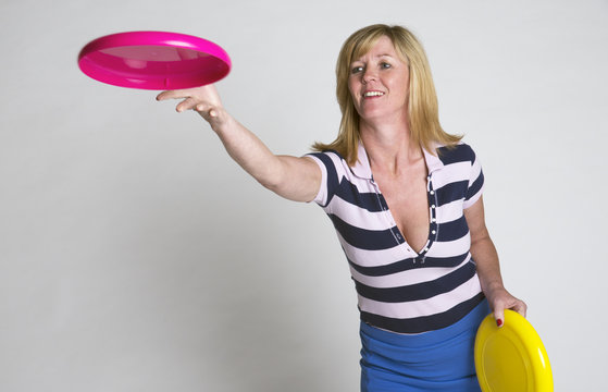 Woman throwing a frisbee disc