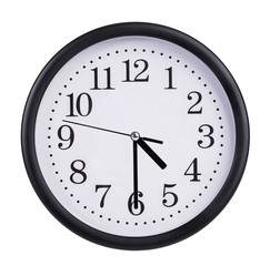 Office clock shows half past four